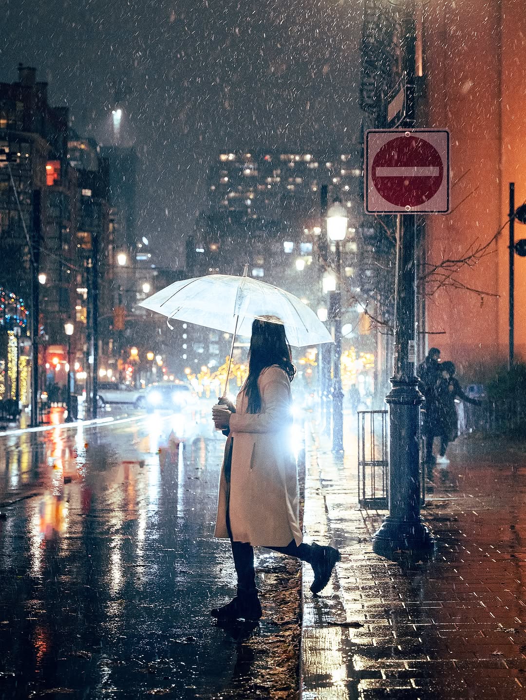 Woman with umbrella by @manojklohar